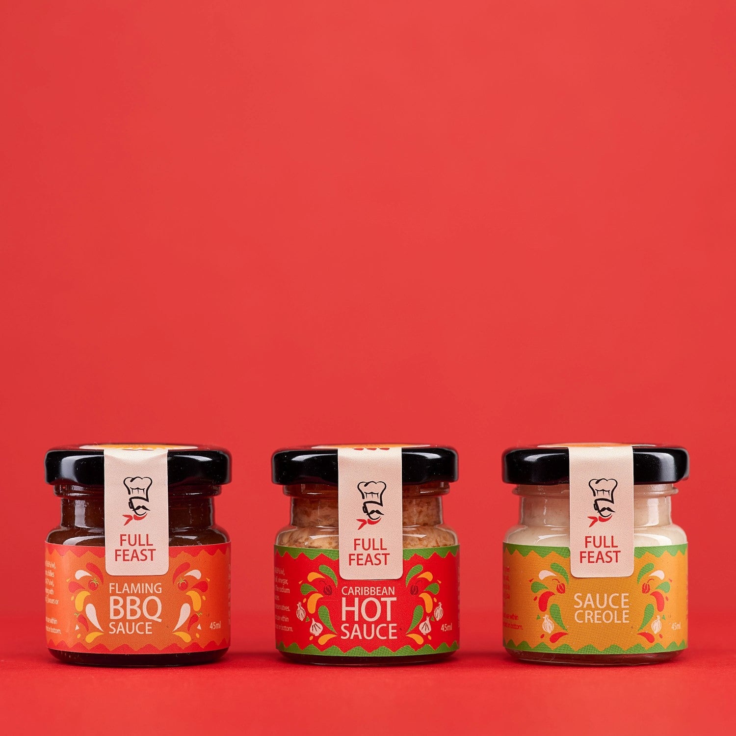 Full Feast Spicy Discovery Trio — hot sauce gift set with three Caribbean sauces — front label