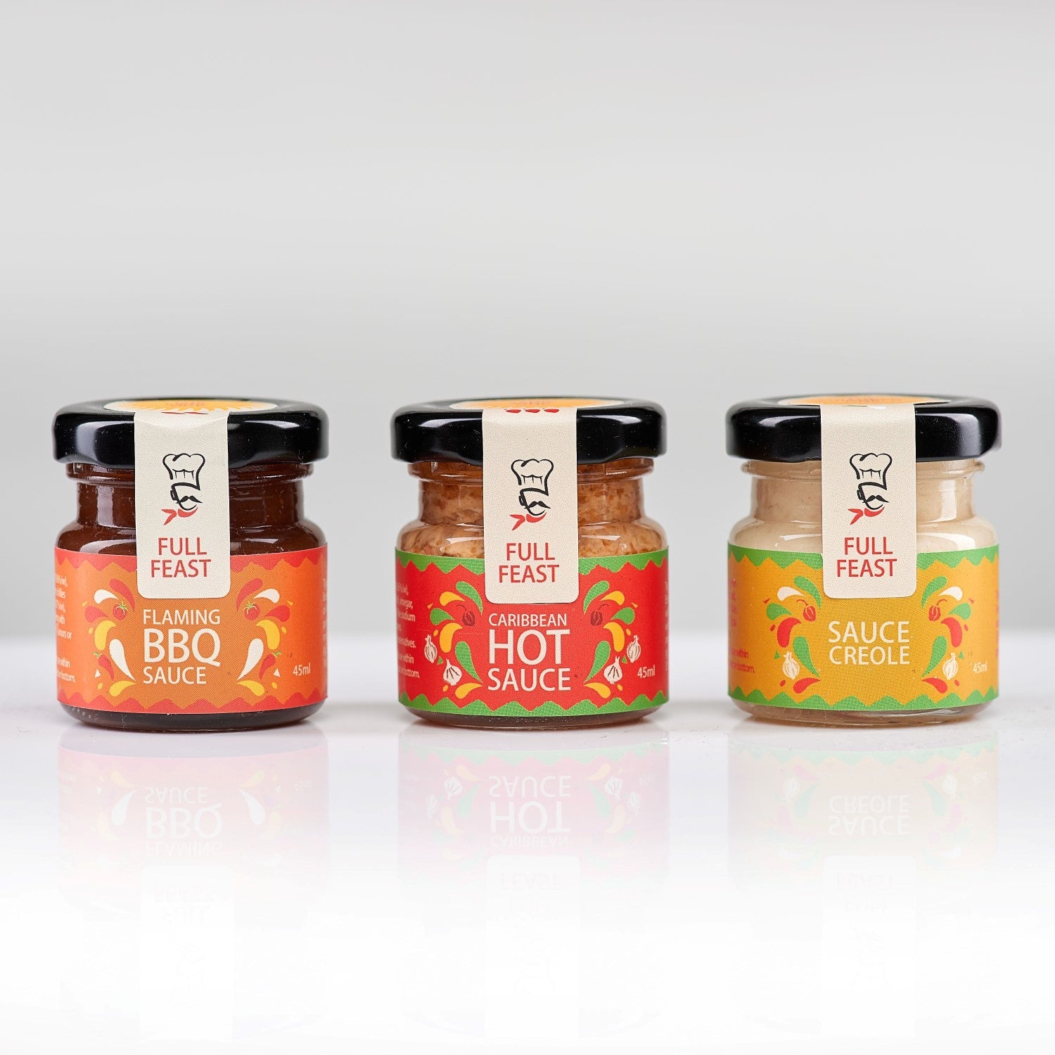 Full Feast Spicy Discovery Trio — hot sauce gift set with three Caribbean sauces — close-up