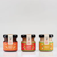 Full Feast Spicy Discovery Trio — hot sauce gift set with three Caribbean sauces — serving suggestion